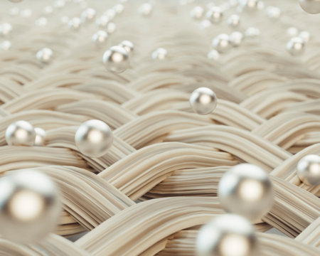 An extreme magnification of a weave of cream individual fabric threads being penetrated by silver...