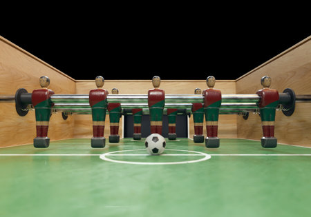 One side of a vintage foosball or table football table with worn metal figures styled in kit...