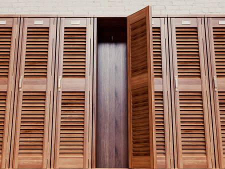 A row of vintage wooden louvered door lockers with one open door revealing an empty interior - 3D renderの写真素材