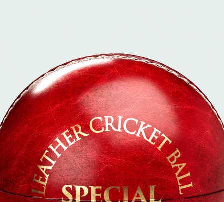 A regular red cricket ball with white stitching and generic gold branding on an isolated background - 3D renderの写真素材