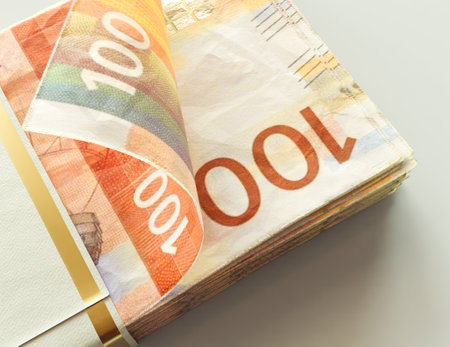 A bundled wad of kroner banknotes on an isolated light background - 3D render