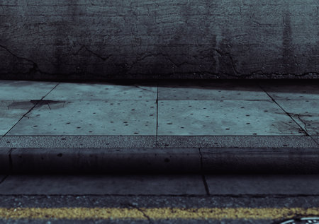 An eye level section of a worn and grubby empty street, paved sidewalk and blank brick wall at night - 3D renderの写真素材