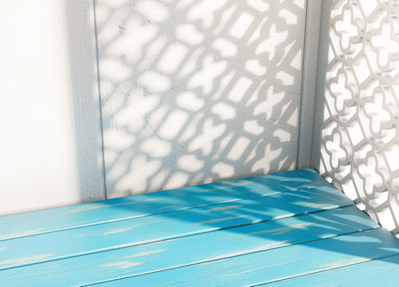 An outdoor concrete surface on a mediterranean architecture patterned background backdrop in  light sunlight - 3D renderの写真素材