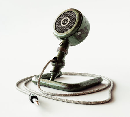A vintage antique desk microphone on an isolated white background - 3D renderの写真素材