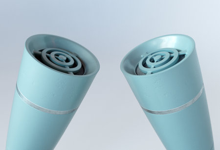 3D render of two vintage desk microphones in conversation on a white background, ideal for podcast,...