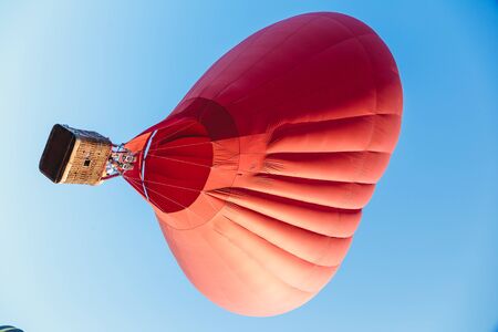A red balloon in the shape of a heart. The biggest Valentineの写真素材