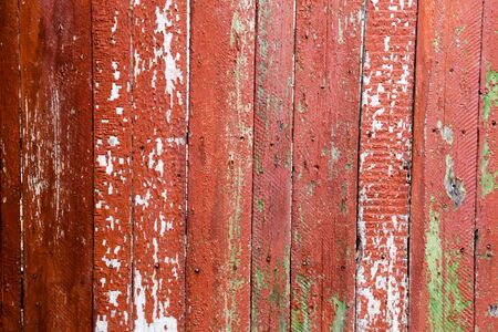 Old wooden painted fence. Painted boards. Backgroundの写真素材