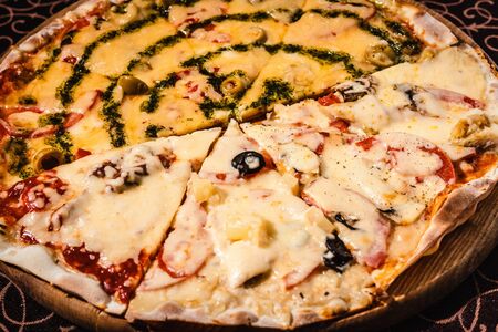 Pizza with cheese, mushrooms and sausageの写真素材