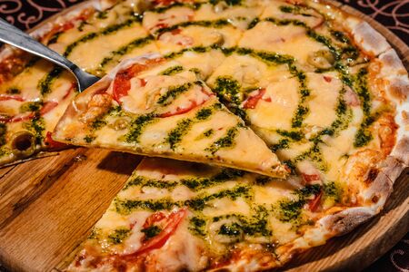 Pizza with cheese, mushrooms and sausage