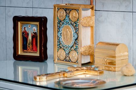 Icons of the crucifixion and the bible for the ordinance of baptism