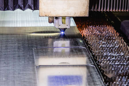 Process of industrial laser cutting of sheet metal