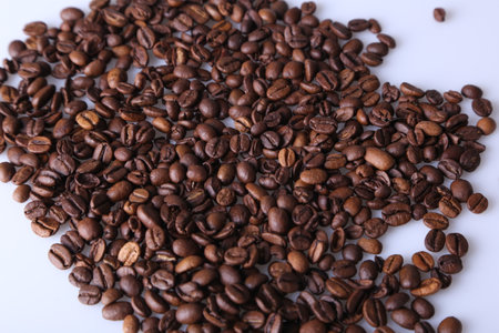 Coffee beans isolated on white background with copyspace for text. Coffee background or texture conceptの写真素材