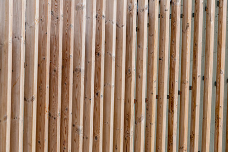 Wooden fence in the garden. Texture of wooden planks.の写真素材