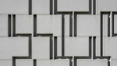 Close-up of a wall made of concrete blocks. Abstract background.