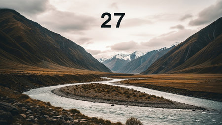 Number 27 against scenic view of mountains and valley under cloudy sky in New Zealand