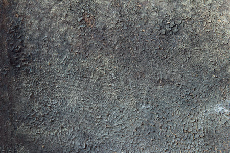 Aerial view of a cracked landscape of earth, rock, and sulfur with relief and holes. Artistic...