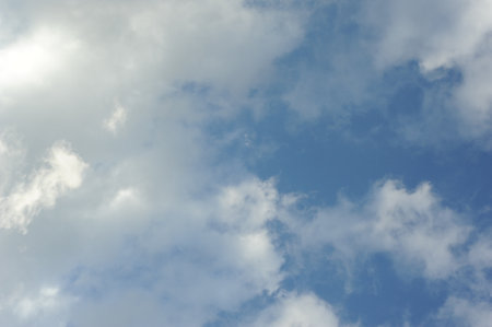 Beautiful white clouds on dark blue sky.の写真素材