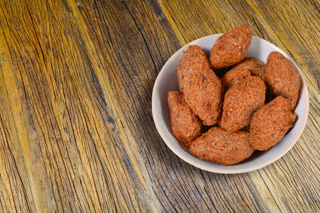 Kibe, Meat Appetizer Kibbeh on a plate, Brazilian Snack Kibe, Arabic cuisine, Lebanon Snack