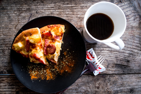 Hawaiian pizza and coffee.の写真素材