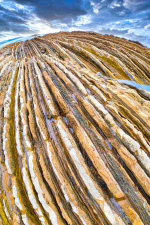 Steeply-tilted Layers of Flysch, Flysch Cliffs, Basque Coast UNESCO Global Geopark, European Geopark Network, Zumaia, Guipuzcoa, Basque Country, Spain, Europeの写真素材