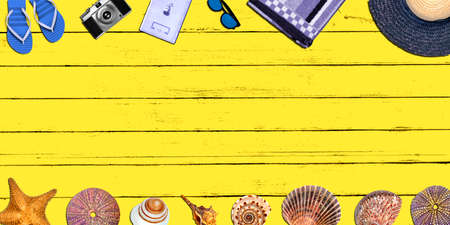 Topview Beach Accessories Background on Yellow Wood
