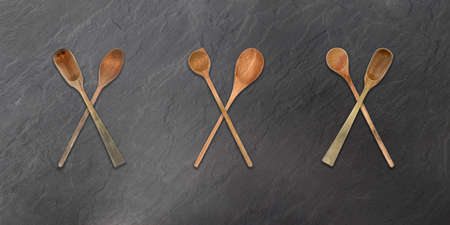Topview of Set Cooking Wooden Spoons on Dark Backgroundの写真素材