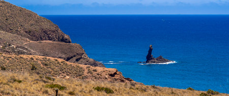 Finger of God, Finger of Neptuno, Cala de las Sirenas, Cabo de Gata-Nijar Natural Park, UNESCO Biosphere Reserve, Hot Desert Climate Region, Almeria, Andalucia, Spain, Europeのeditorial素材