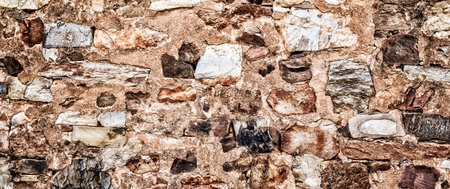 Natural Stone Wall Textured Backgroundの写真素材