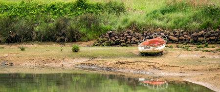 Old boats, Estuary of Barro, Barro, Llanes, Protected Landscape of the Oriental Coast of Asturias, Asturias, Spain, Europeの写真素材
