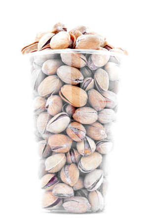 Pistachio nuts in plastic cup, isolated on white background