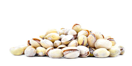 Pistachio nuts heap, isolated on white background
