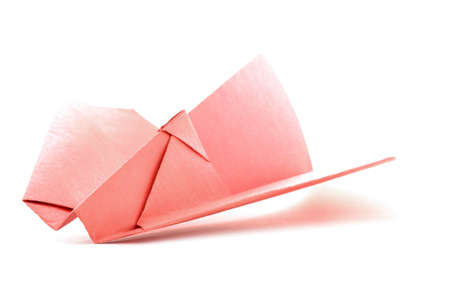 Native origami airplane, paper plane model, isolated on white backgroundの写真素材