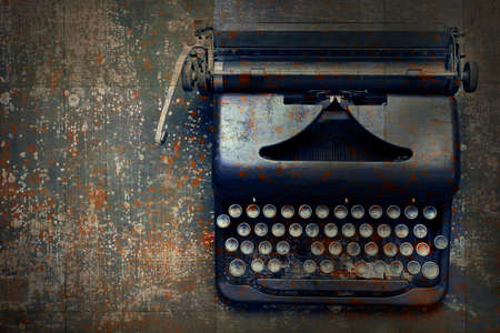 Old vintage typewriter on the floorの写真素材