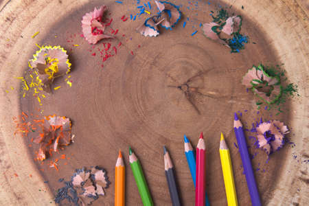 Pastel sticks are placed on a wooden floor.の写真素材