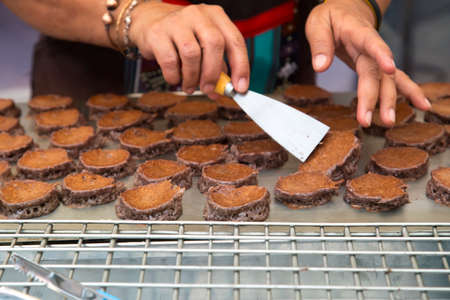 Cooks are making Thai desserts on the stove.の写真素材