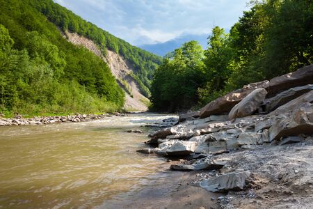 Beautiful landscape of the Carpathian mountains, rocks and river Prutの写真素材