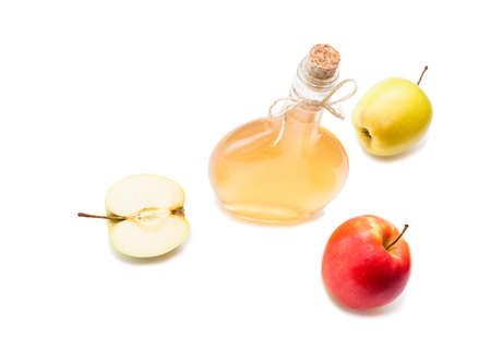 Homemade fermented vinegar with apples isolated on white top viewの写真素材