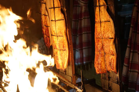 Grilled Salmon on medieval market called Flammlachsの写真素材