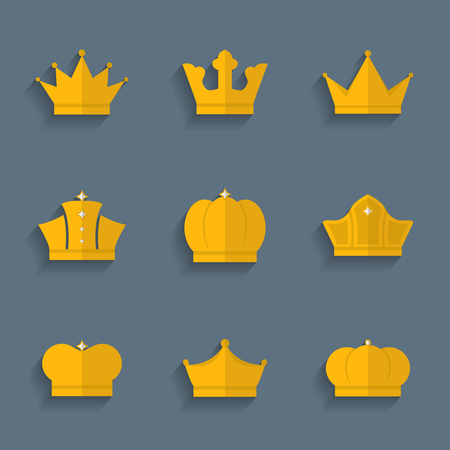 Gold crown set in flat style with shadow isolated on a backgroundの写真素材