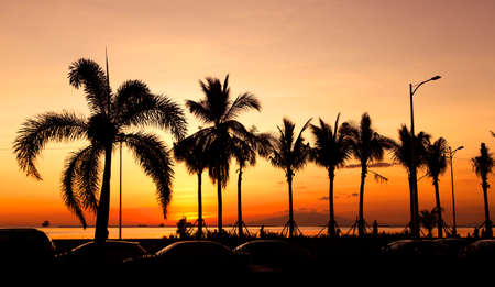 Silhouettes in sunset, Philippines