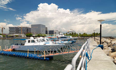 Boats at the port pier in Manila bay, Philippines
