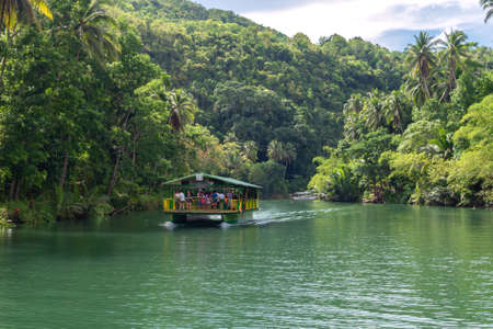 Bohol, Philippines - June, 20, 2019: Floating buffet reastaurant cruise on Loboc Riverの写真素材