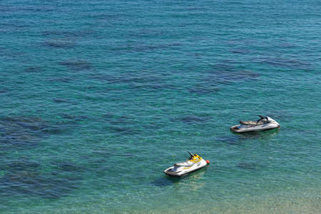 Puerto Galera, Sabang, Philippines - April 4, 2017: Two jet ski in the sea. Water activities on White beachのeditorial素材
