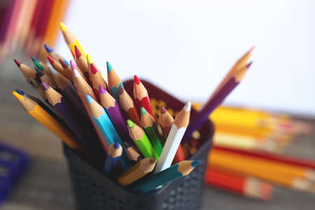 Close up of many colored pencils, macro. Art class student or workspace conceptの写真素材