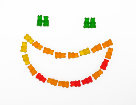 happy smiling face from candyの写真素材