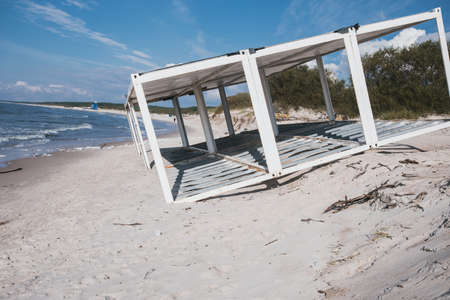 abandonment old container on the sandy beachの写真素材