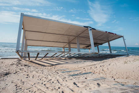 abandonment old container on the sandy beachの写真素材