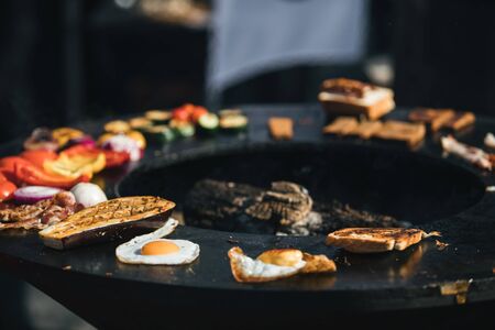 English breakfast fried on open fire BBQ