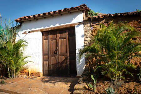 Old wooden door entry in old town; Barichara, Santander, Colombia