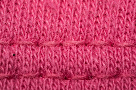 Pink stitches wool textile pattern macro, clothingの写真素材